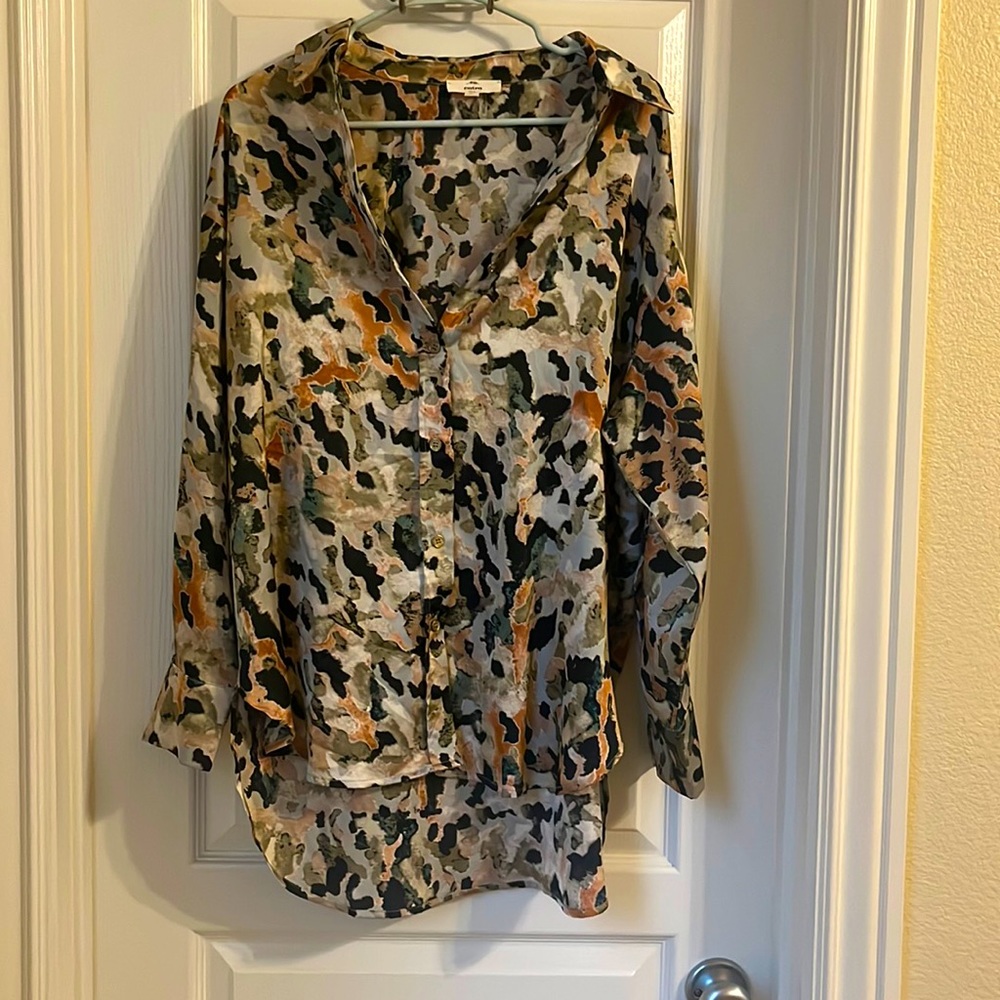 Multi-color animal print satin blouse.